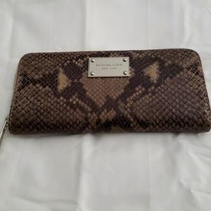 Michael Kors python leather wallet.